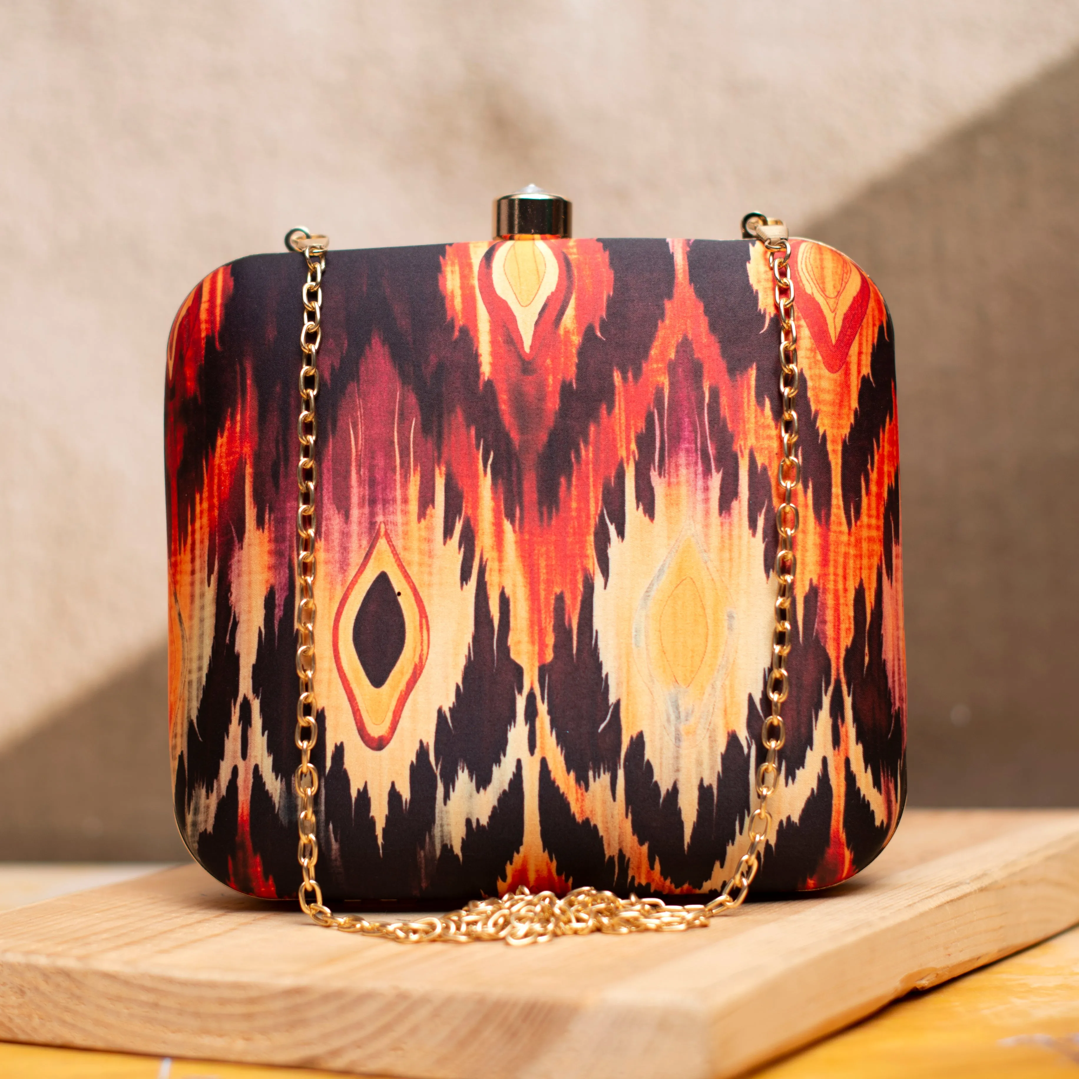 Black Based Multicoloured Ikkat Printed Clutch